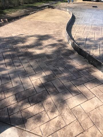 Stamped concrete patio in herringbone pattern