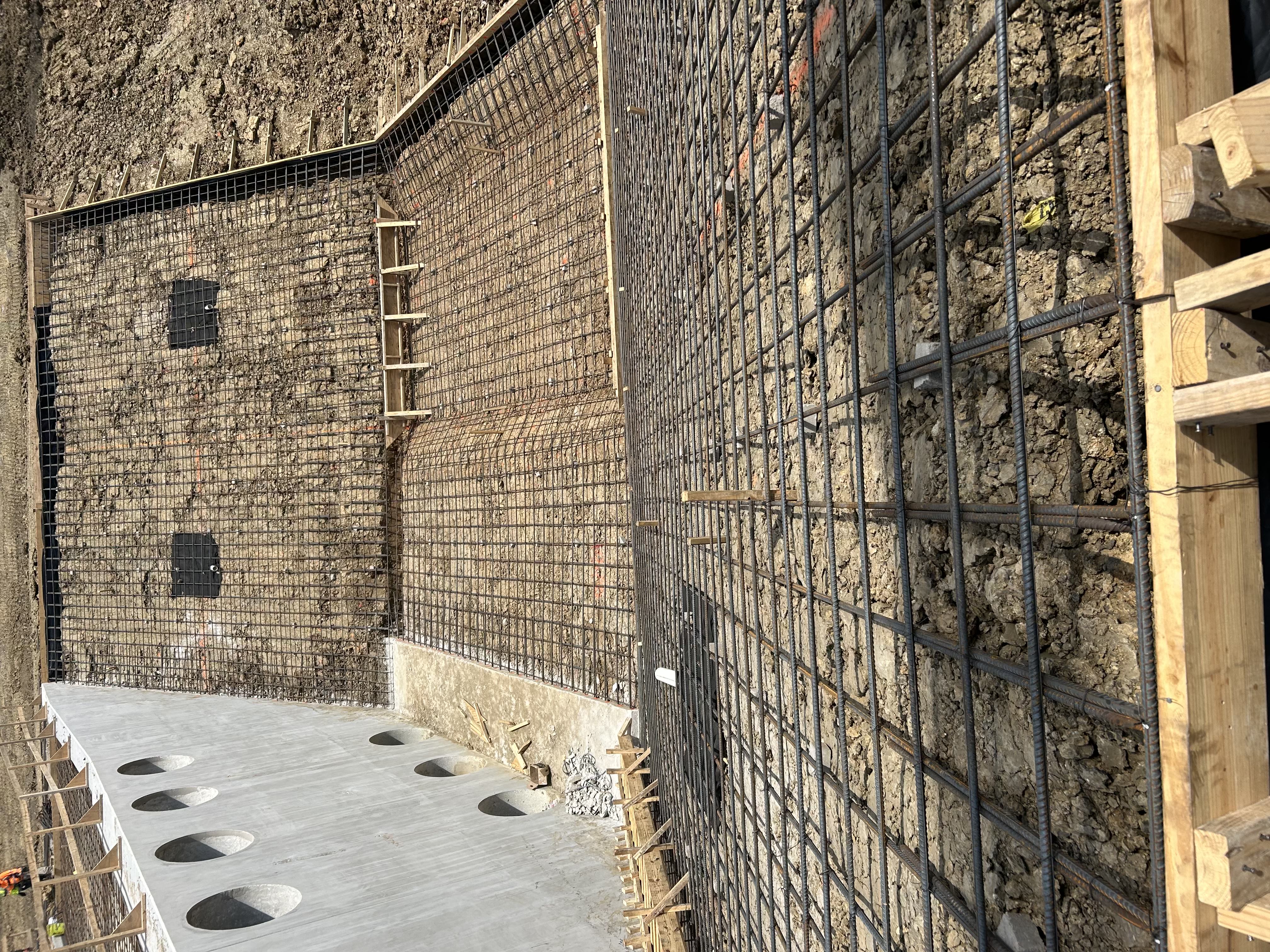 Foundation wall construction with rebar