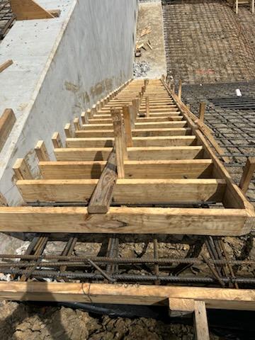 Stair forms and rebar for concrete foundation